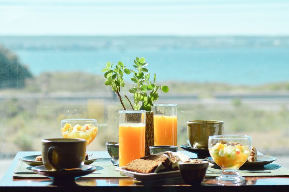 Breakfast table with several dishes at the hotel