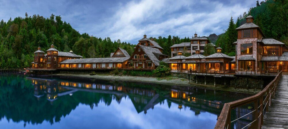 Lakeside lodge with multiple wings on Puyuhuapi bay