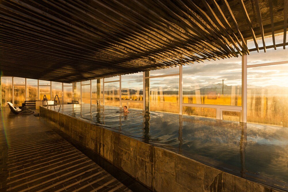 Large indoor swimming pool at Remota Hotel in Puerto Natales